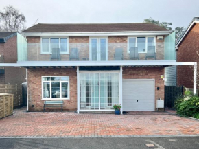 4 Bed Retreat with Balcony & Estuary views